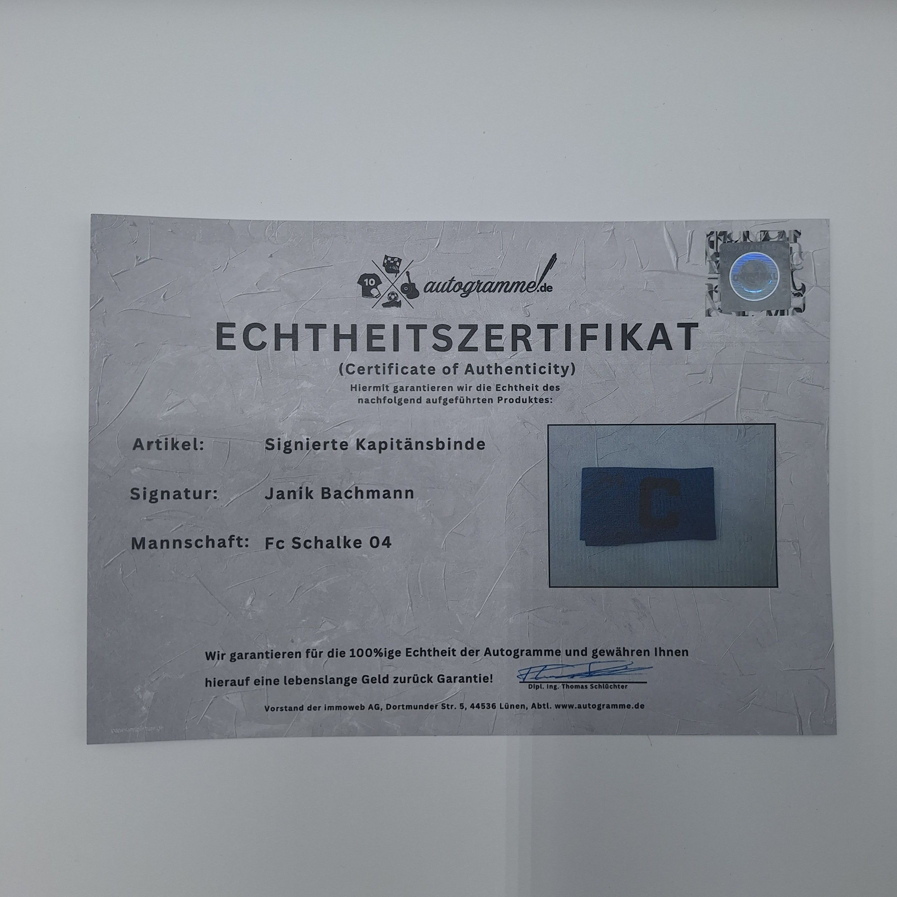 Kapitänsbinde Janik Bachmann signiert im Rahmen Schalke 04 COA blau