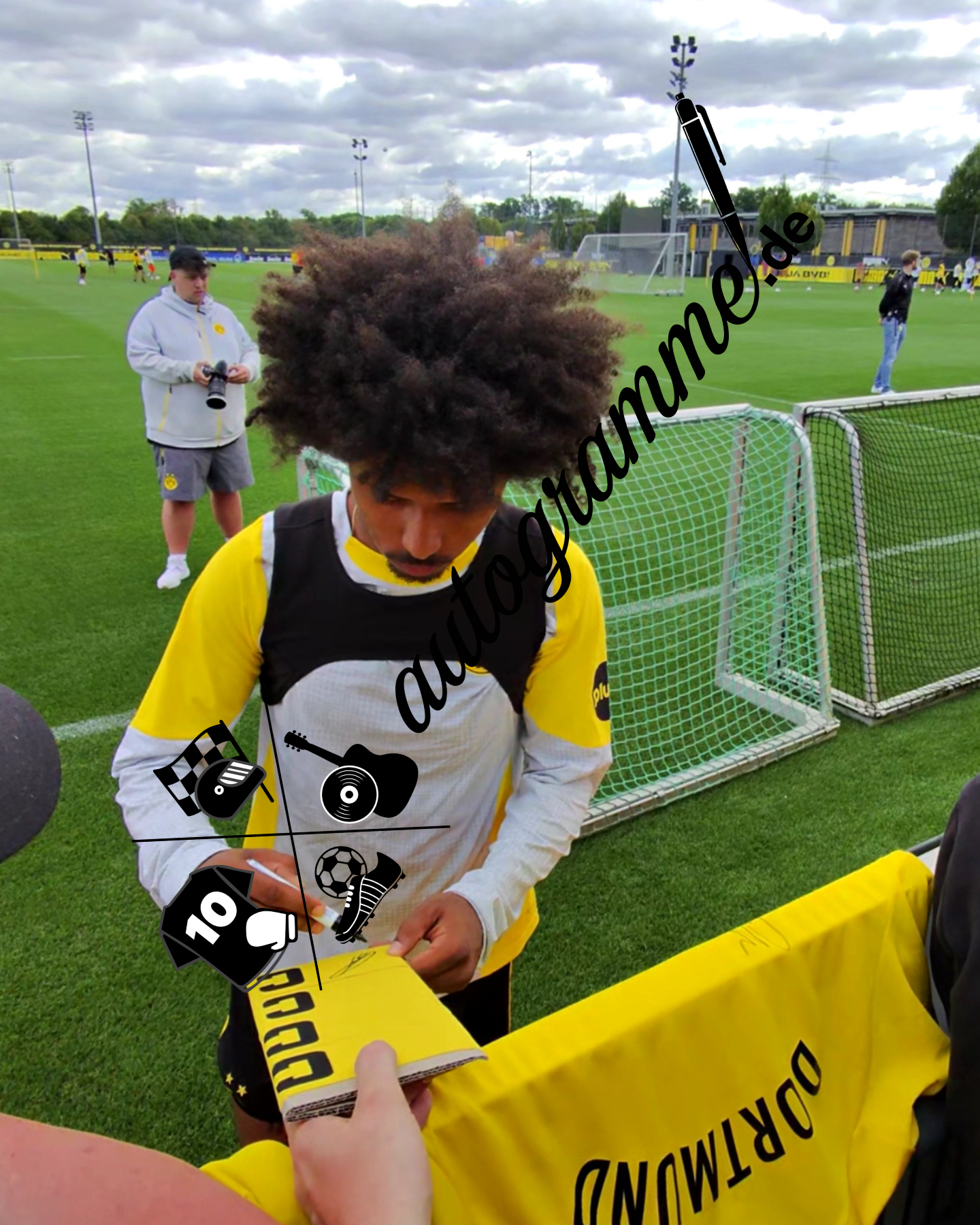 Captain's armband signed by Karim Adeyemi in a Borussia Dortmund autograph COA frame