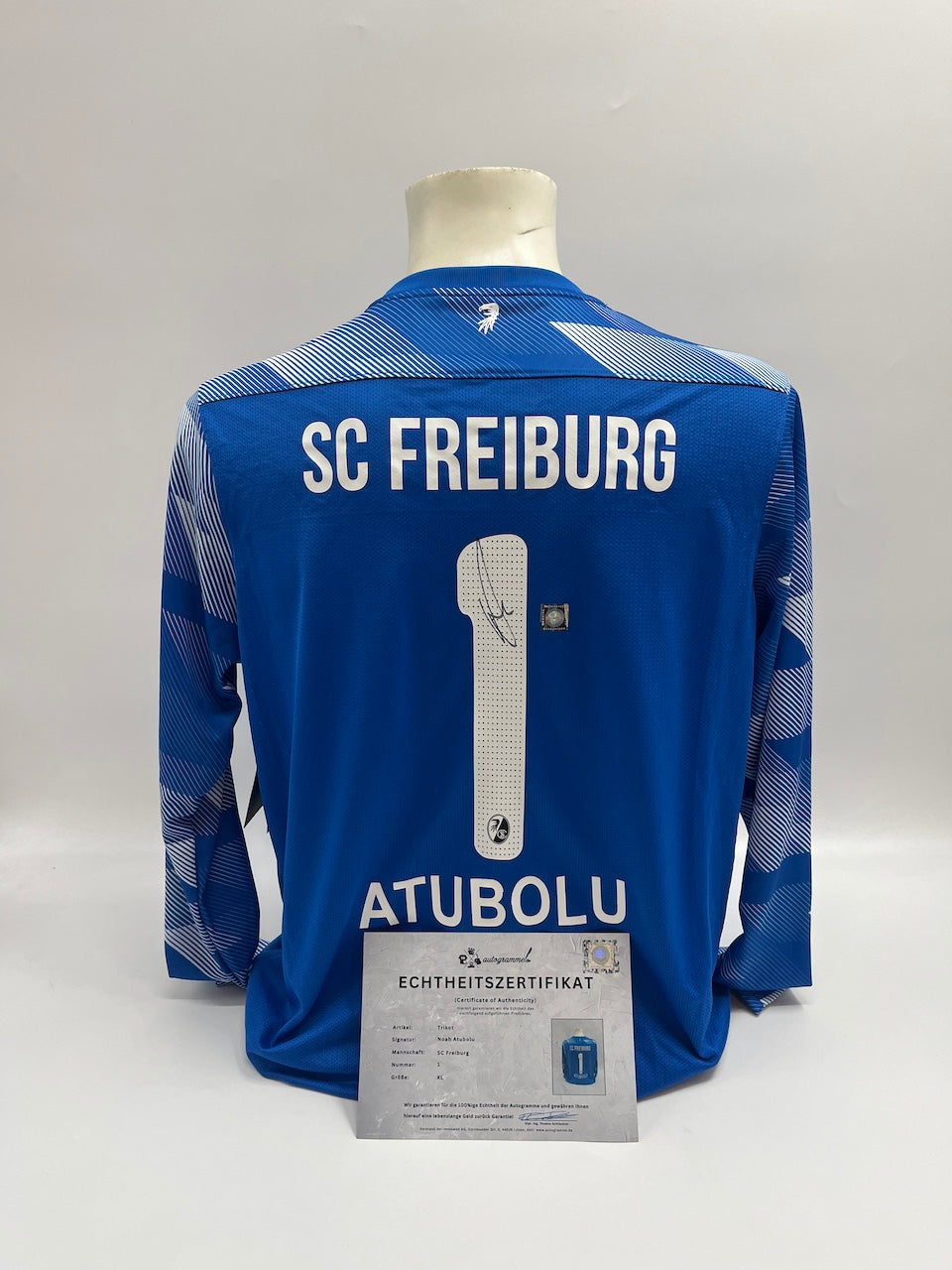 SC Freiburg goalkeeper jersey signed by Noah Atubolu, Nike XL