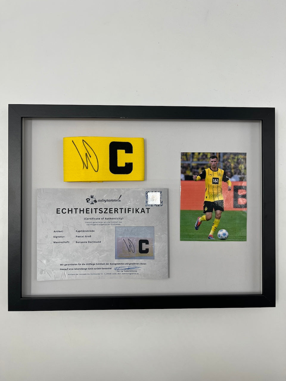 Captain's armband signed by Pascal Groß as part of the Borussia Dortmund COA