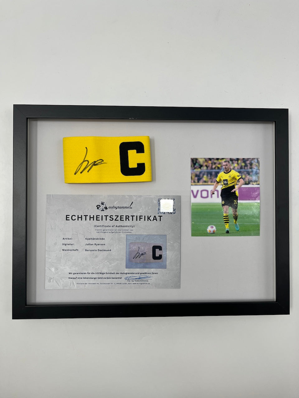 Captain's armband signed by Julian Ryerson as part of the Borussia Dortmund COA