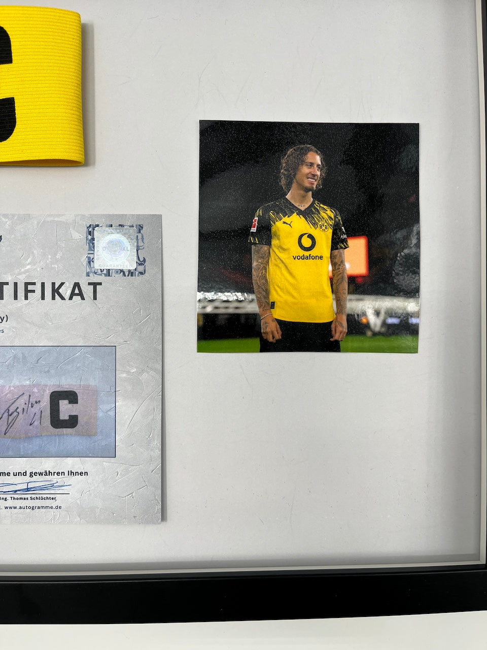 Captain's armband signed by Fabio Silva as part of the Borussia Dortmund COA