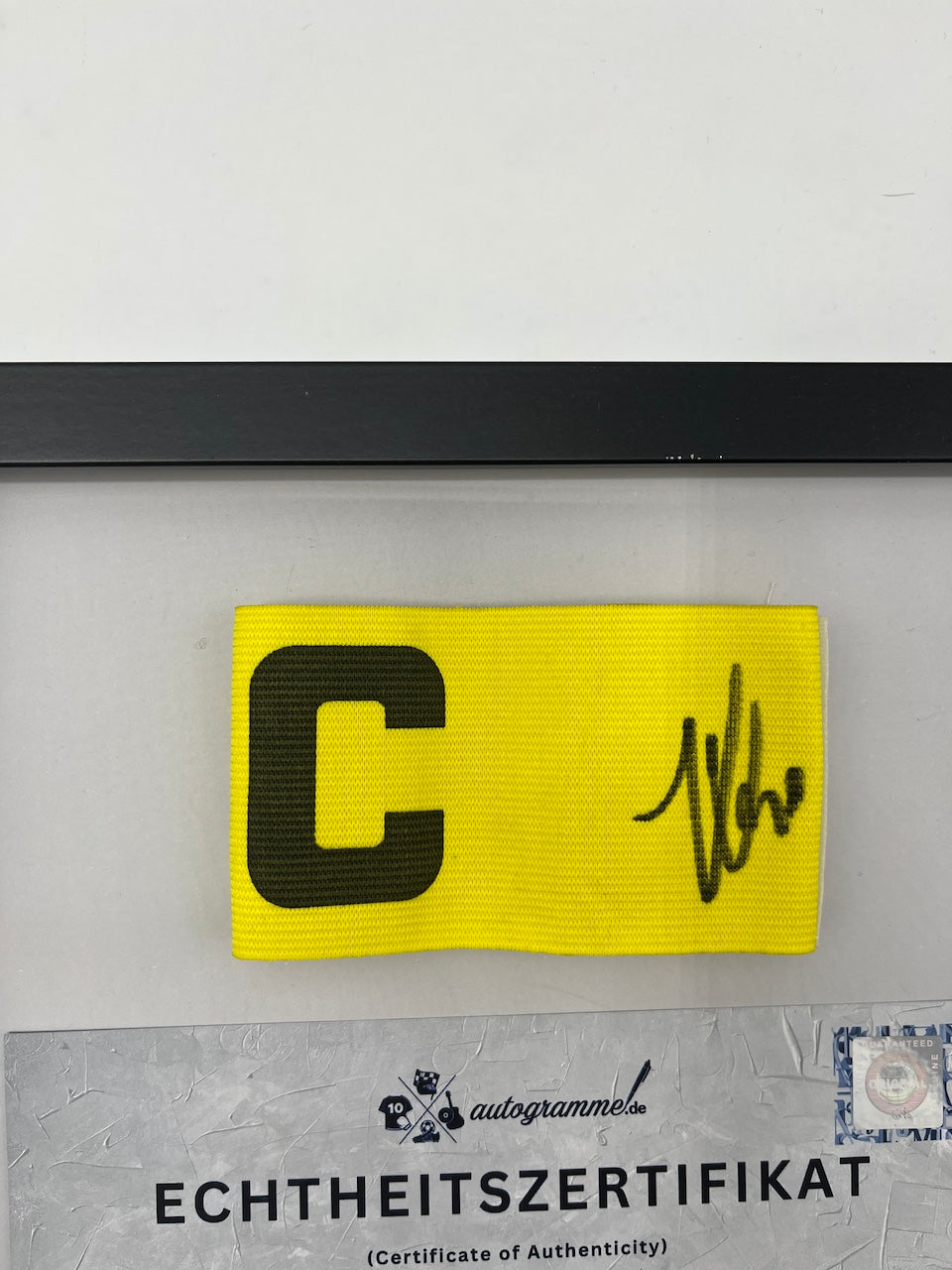 Captain's armband signed by Lucas Chevalier in a PSG COA frame