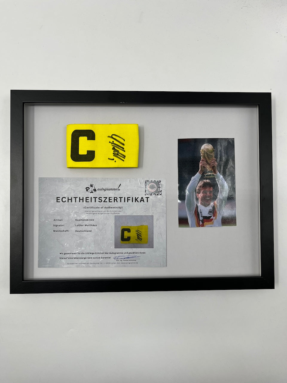 Captain's armband signed by Lothar Matthäus in a frame Germany COA