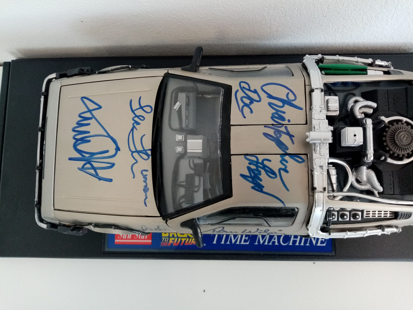 Back to the future model car signed by the actors of the film