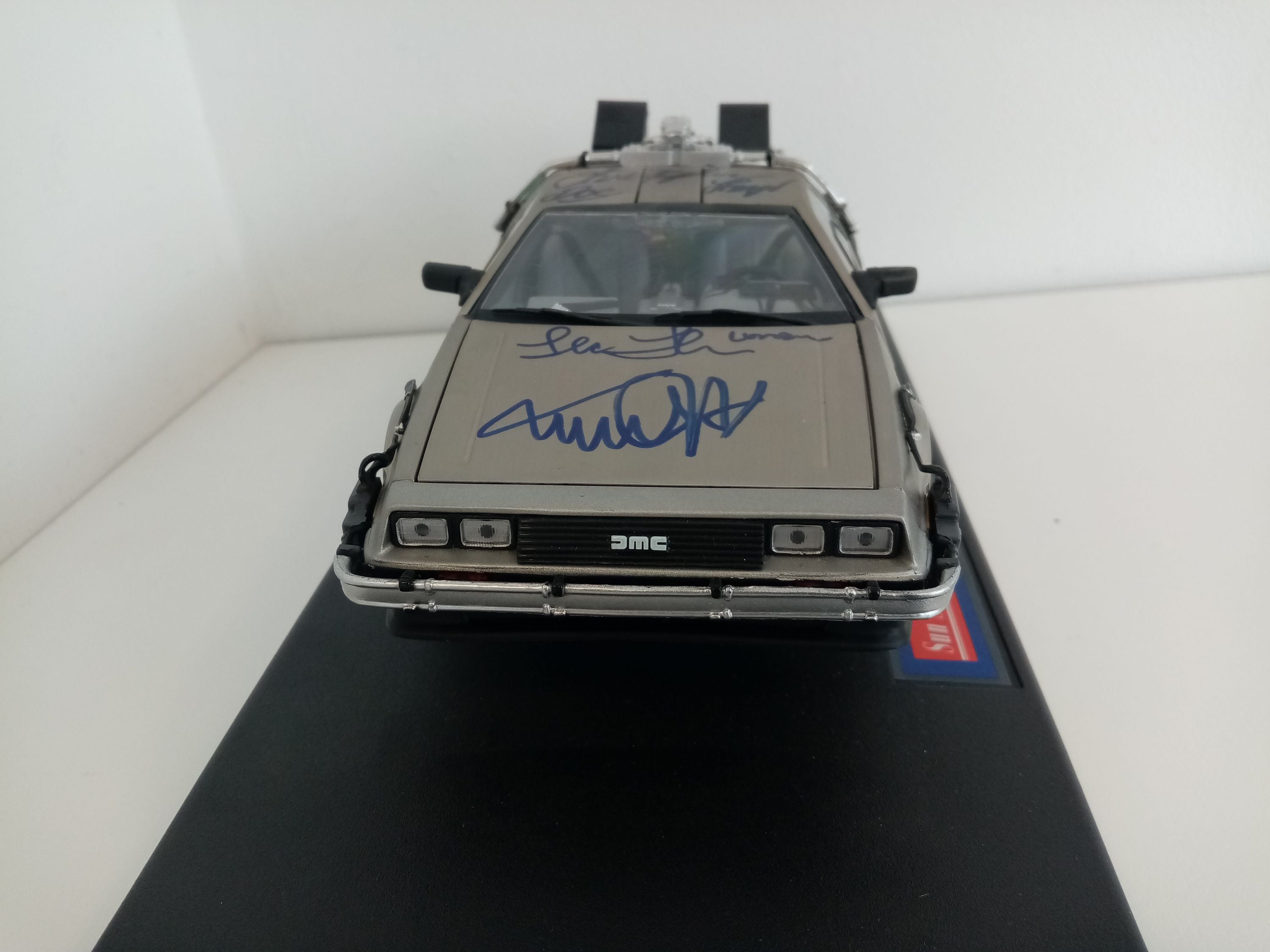 Back to the future model car signed by the actors of the film