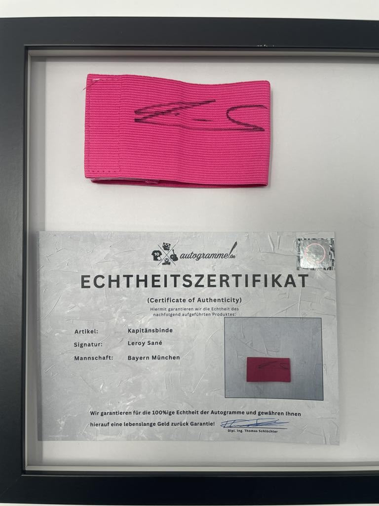 Captain's armband signed by Leroy Sane in a Bayern Munich autograph frame