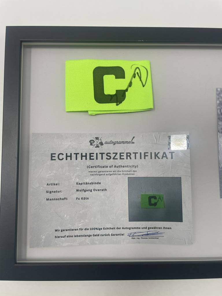 Captain's armband Wolfgang Overath signs in a frame 1. FC Köln autograph