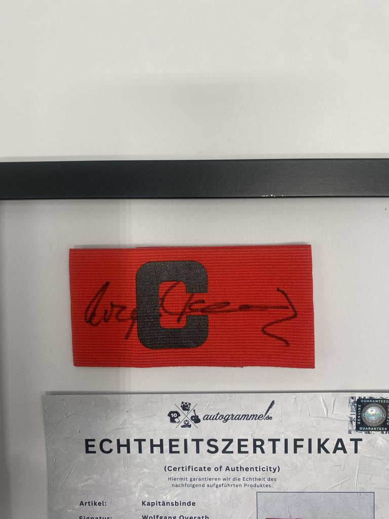 Captain's armband Wolfgang Overath signs in a frame 1. FC Köln autograph