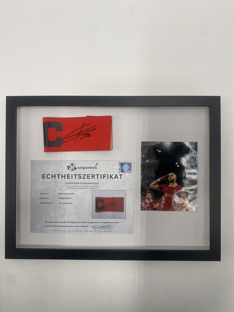 Captain's armband signed by Cody Gakpo in a frame FC Liverpool autograph COA