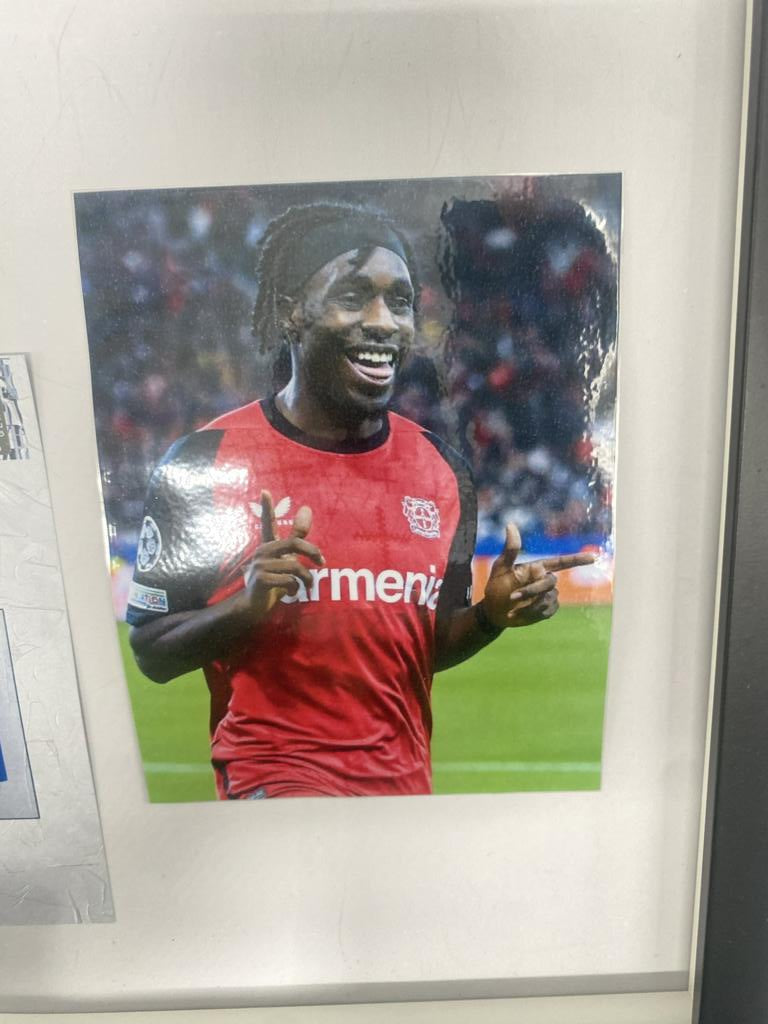 Captain's armband signed by Jeremie Frimpong in a frame, Bayer 04 Leverkusen autograph