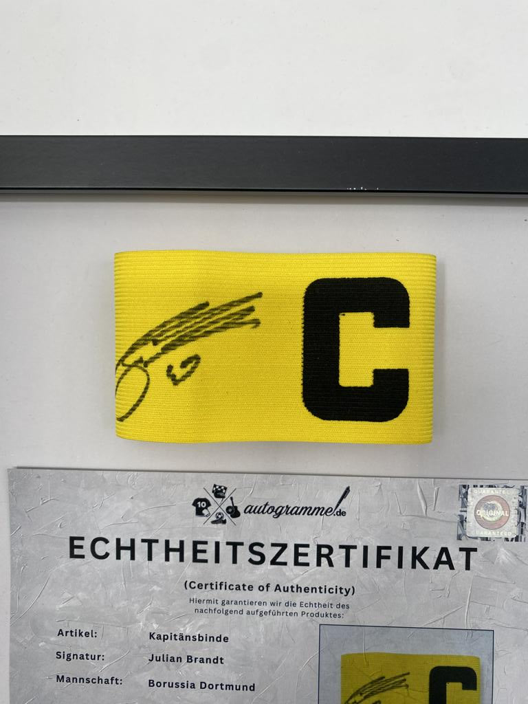 Captain's armband signed by Julian Brandt in a Borussia Dortmund autograph COA frame