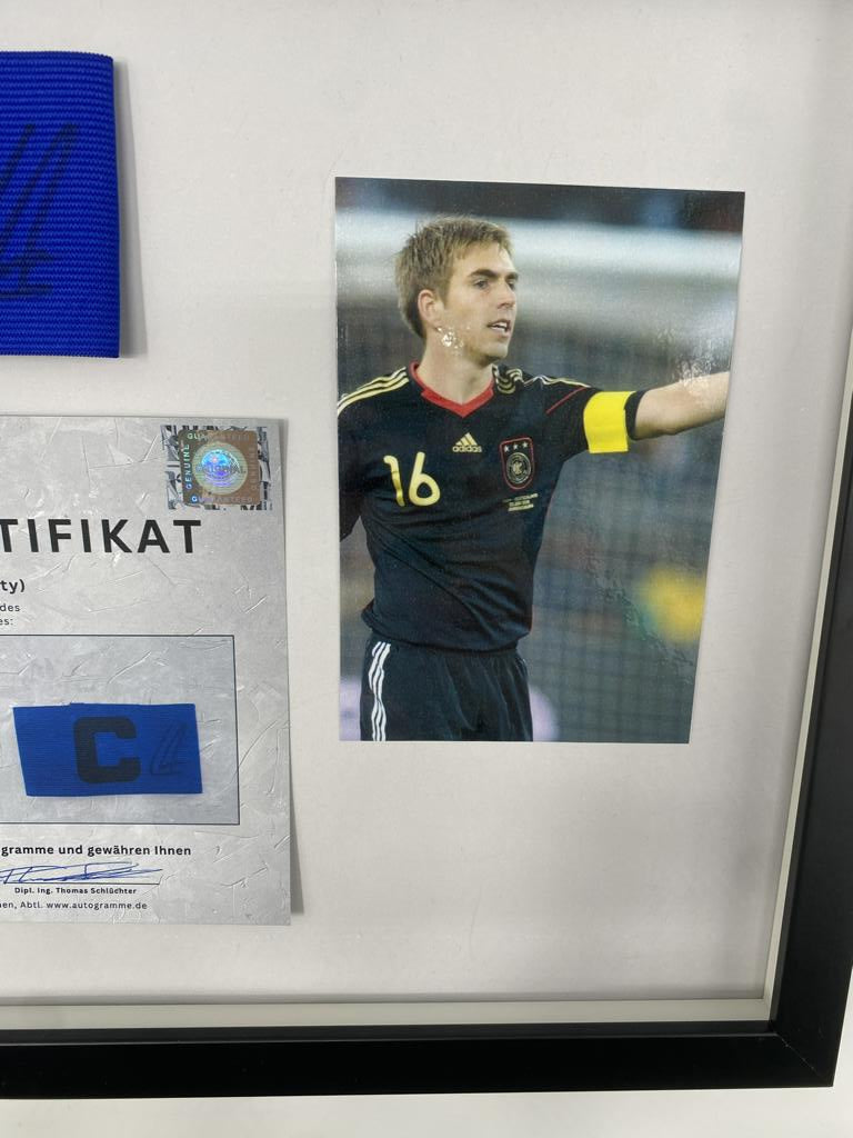 Kapitänsbinde Philipp Lahm signiert im Rahmen Deutschland Autogramm