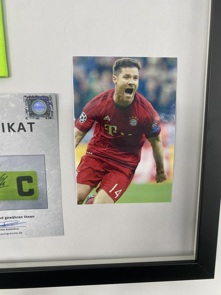 Captain's armband signed by Xabi Alonso in a Bayern Munich autograph COA frame