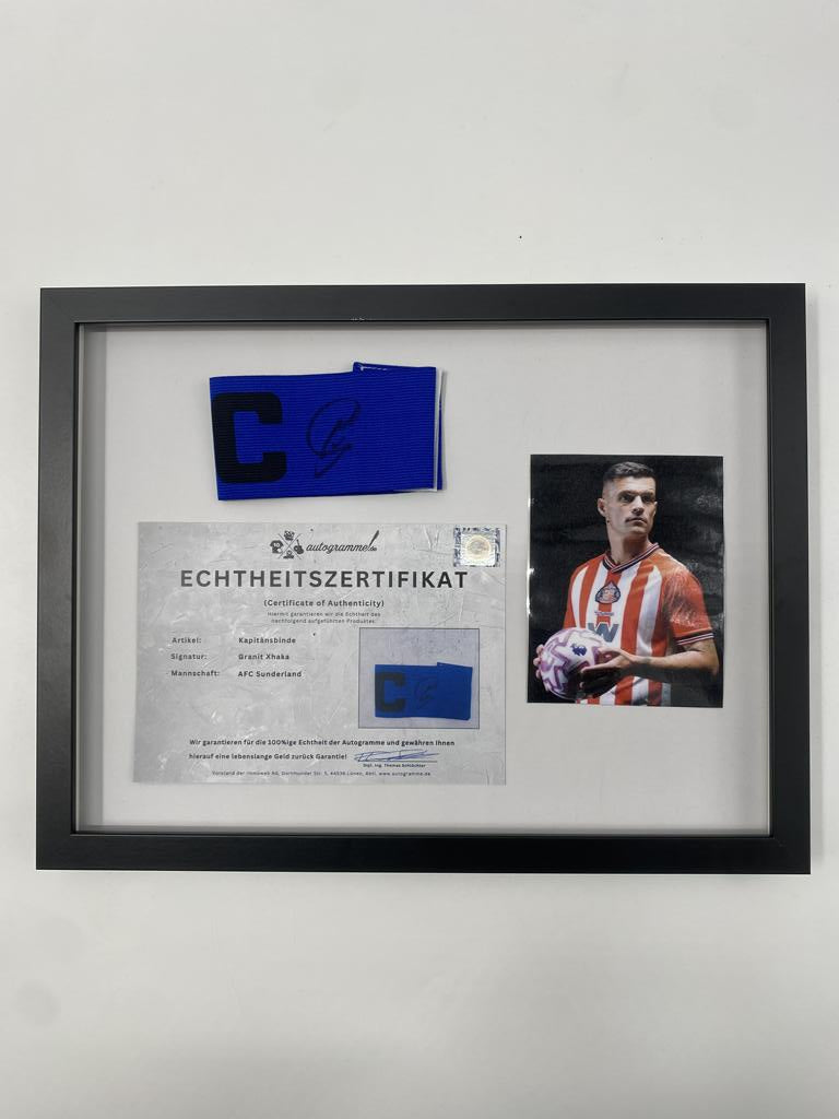 Captain's armband signed by Granit Xhaka in a frame, AFC Sunderland autograph
