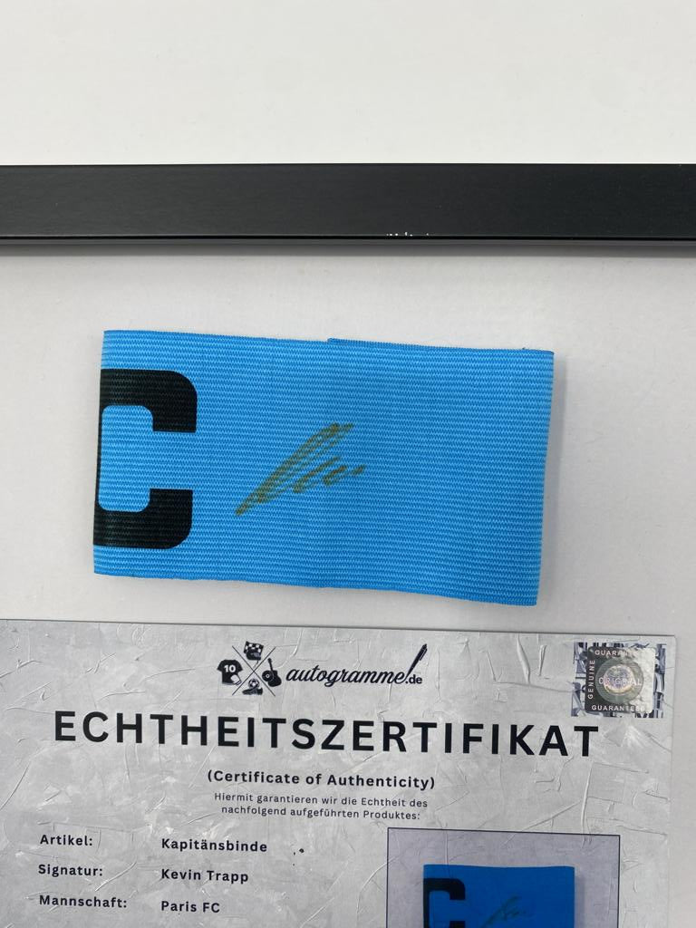 Captain's armband signed by Kevin Trapp in a Paris FC autograph COA frame