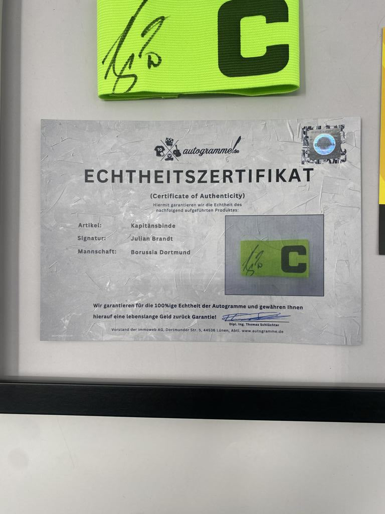 Captain's armband signed by Julian Brandt as part of the Borussia Dortmund COA football campaign