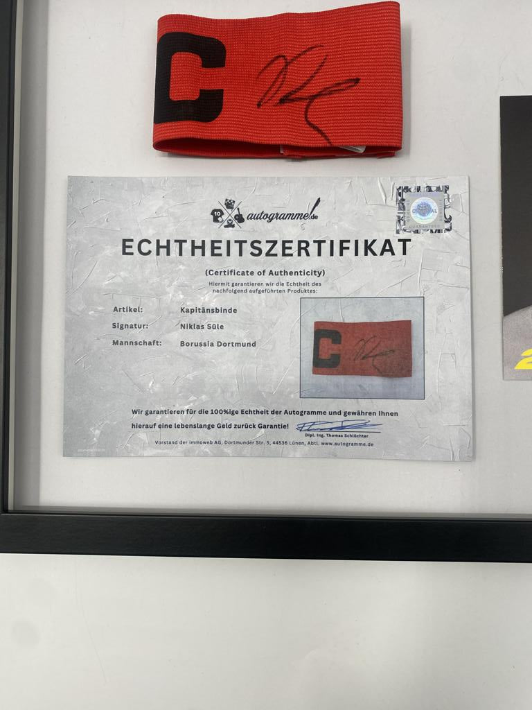 Captain's armband signed by Niklas Süle as part of the Borussia Dortmund COA football campaign