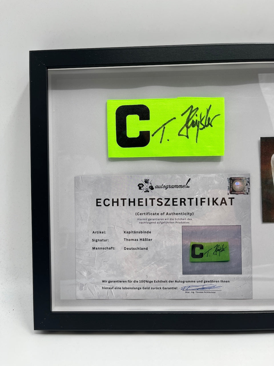 Captain's armband signed by Thomas Häßler in a DFB football autograph COA format