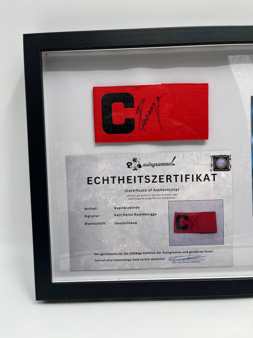 Captain's armband signed by Karl-Heinz Rummenigge in a DFB autograph COA frame