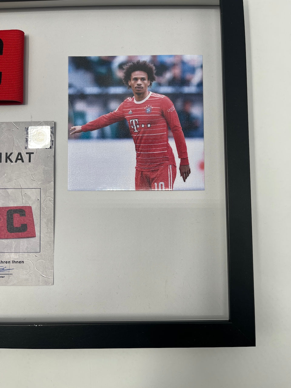 Captain's armband signed by Leroy Sane in a Bayern Munich autograph COA frame