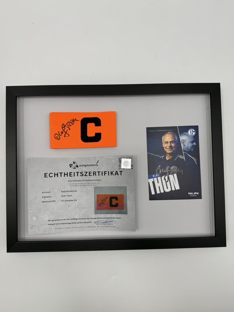 Kapitänsbinde Olaf Thon signiert im Rahmen Schalke 04 COA