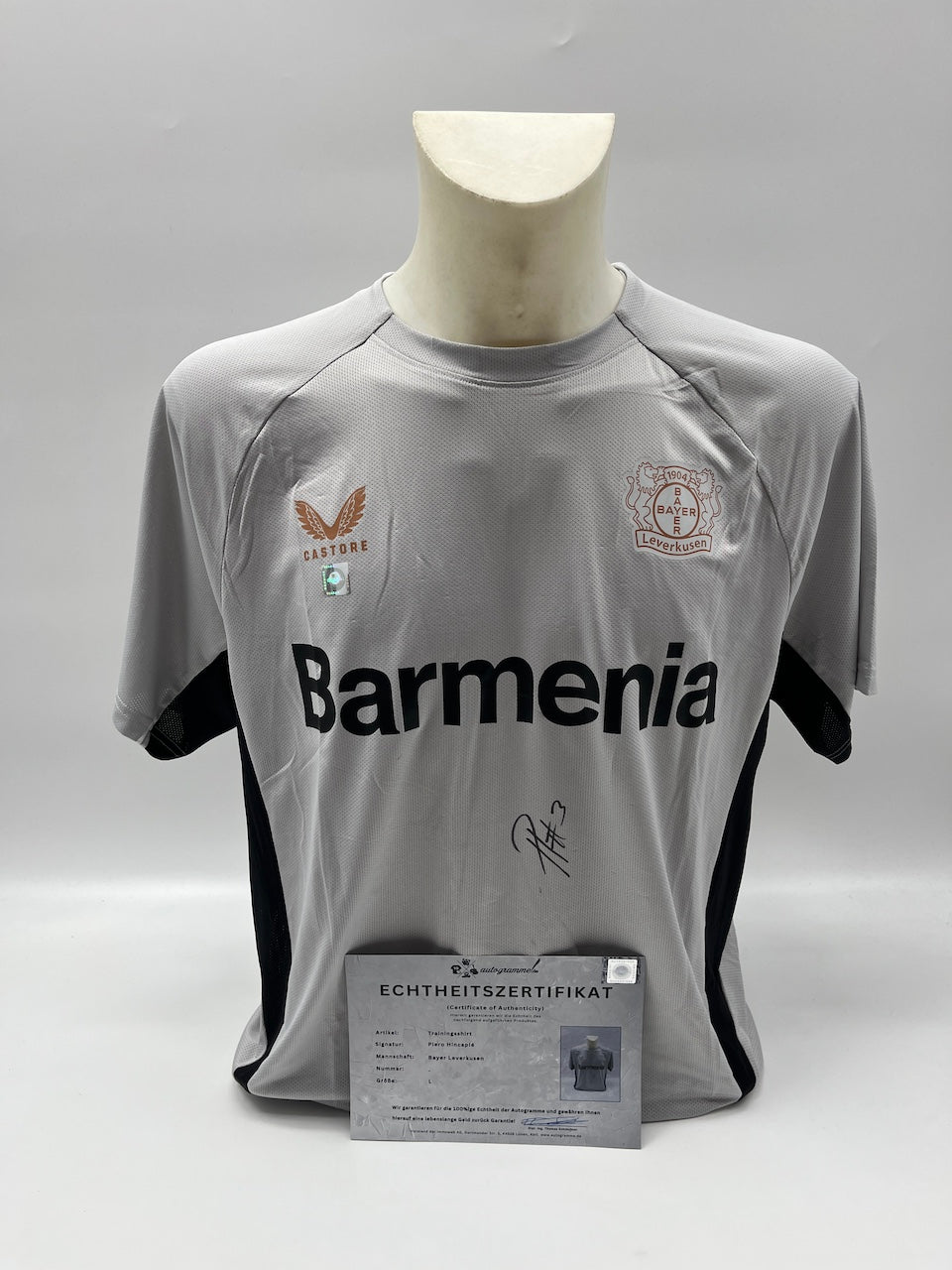 Bayer Leverkusen training shirt signed by Piero Hincapie, Castore L