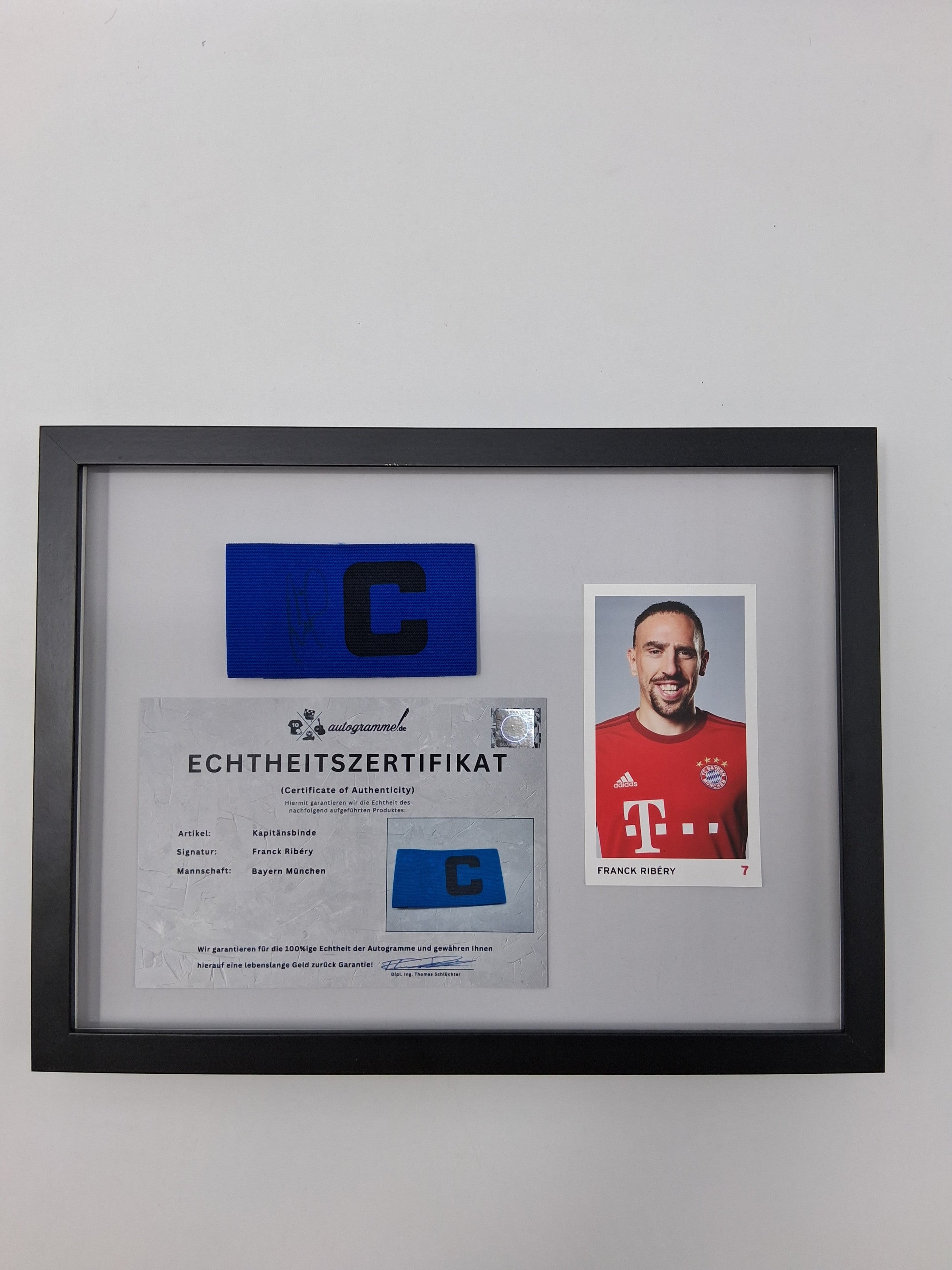 Captain's armband signed by Franck Ribéry in a Bayern Munich football autograph frame