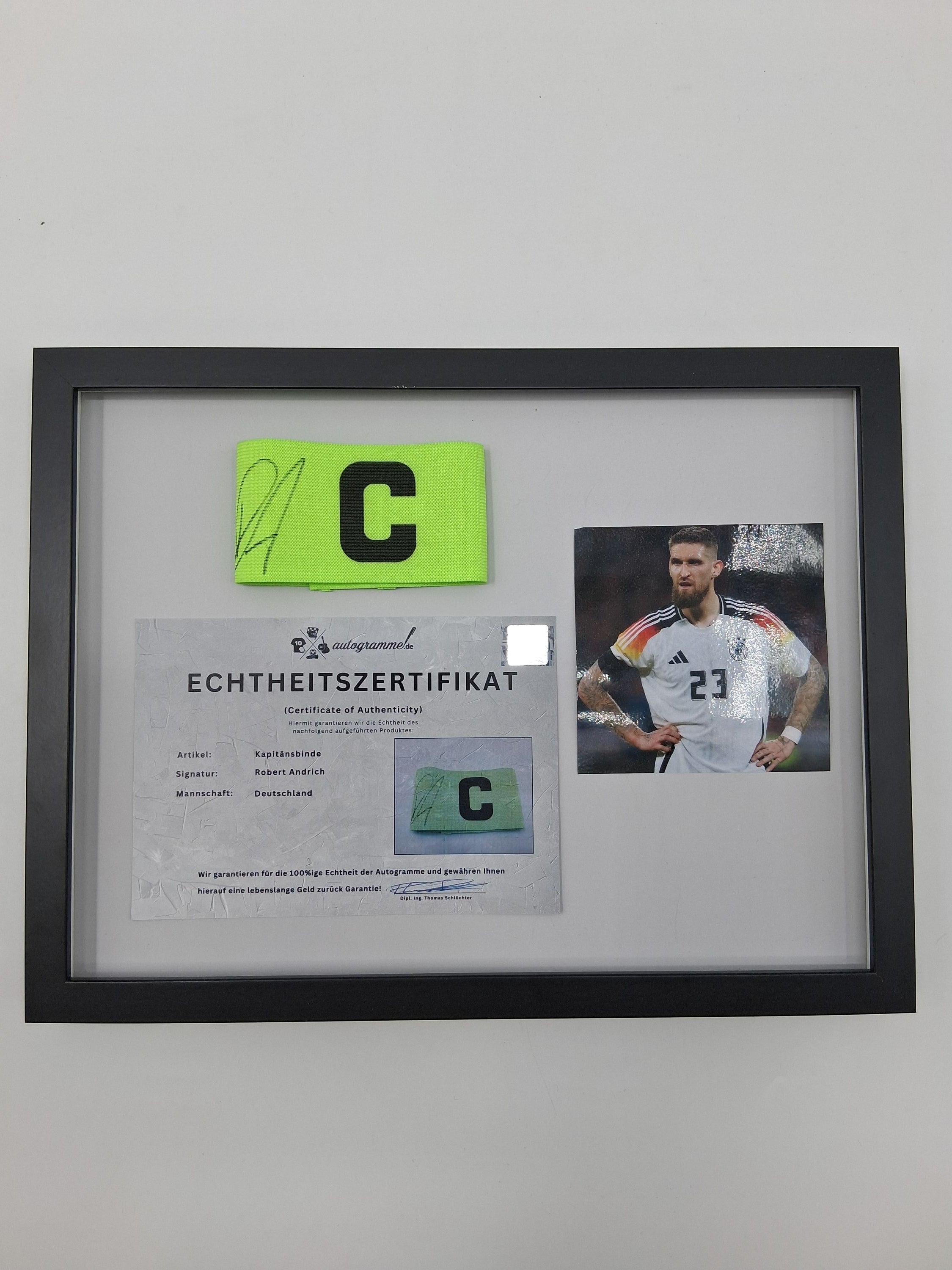 Captain's armband signed by Robert Andrich in a DFB autograph frame