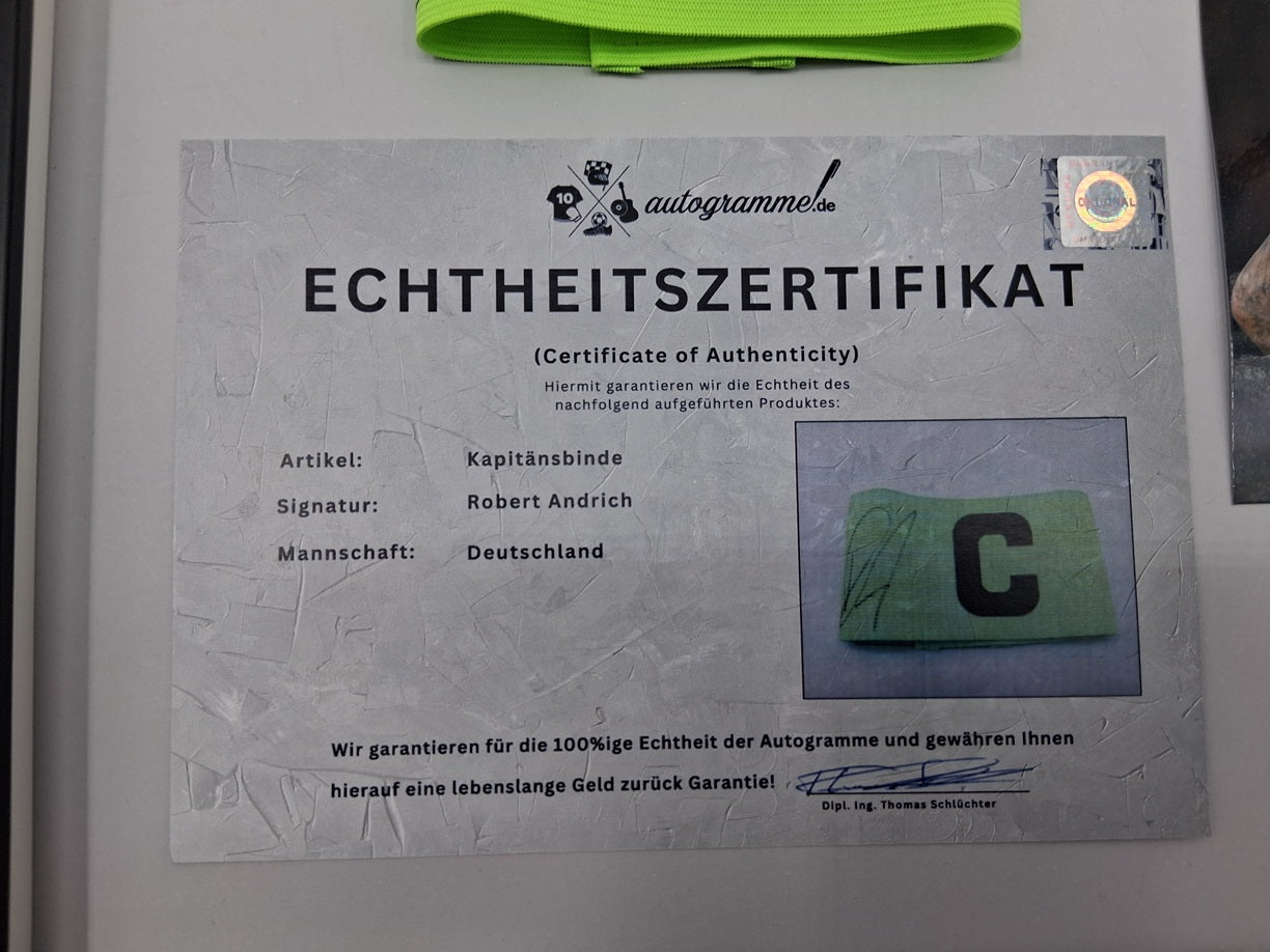 Captain's armband signed by Robert Andrich in a DFB autograph frame
