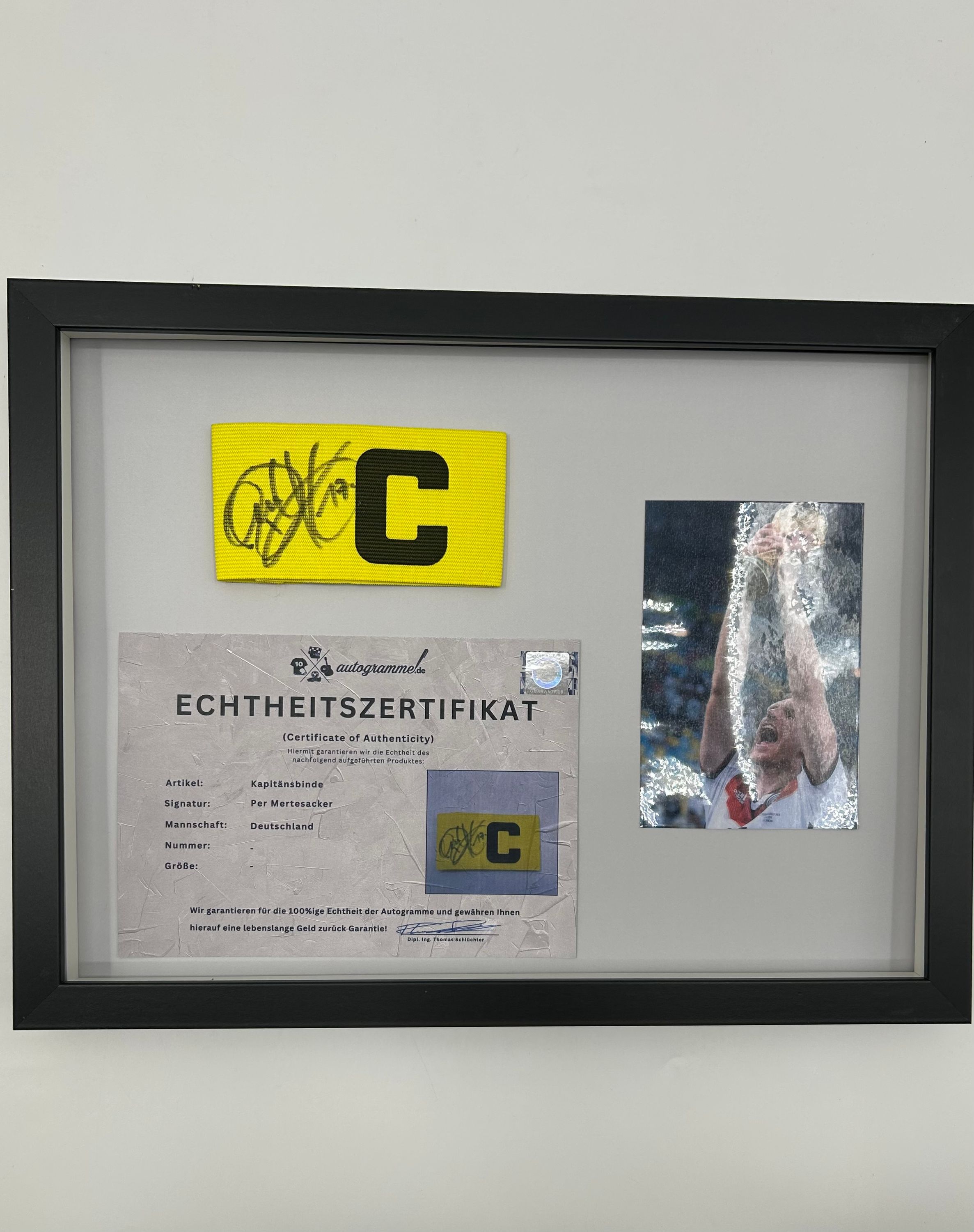 Captain bandage via Mertesacker signed as part of DFB Football autograph COA