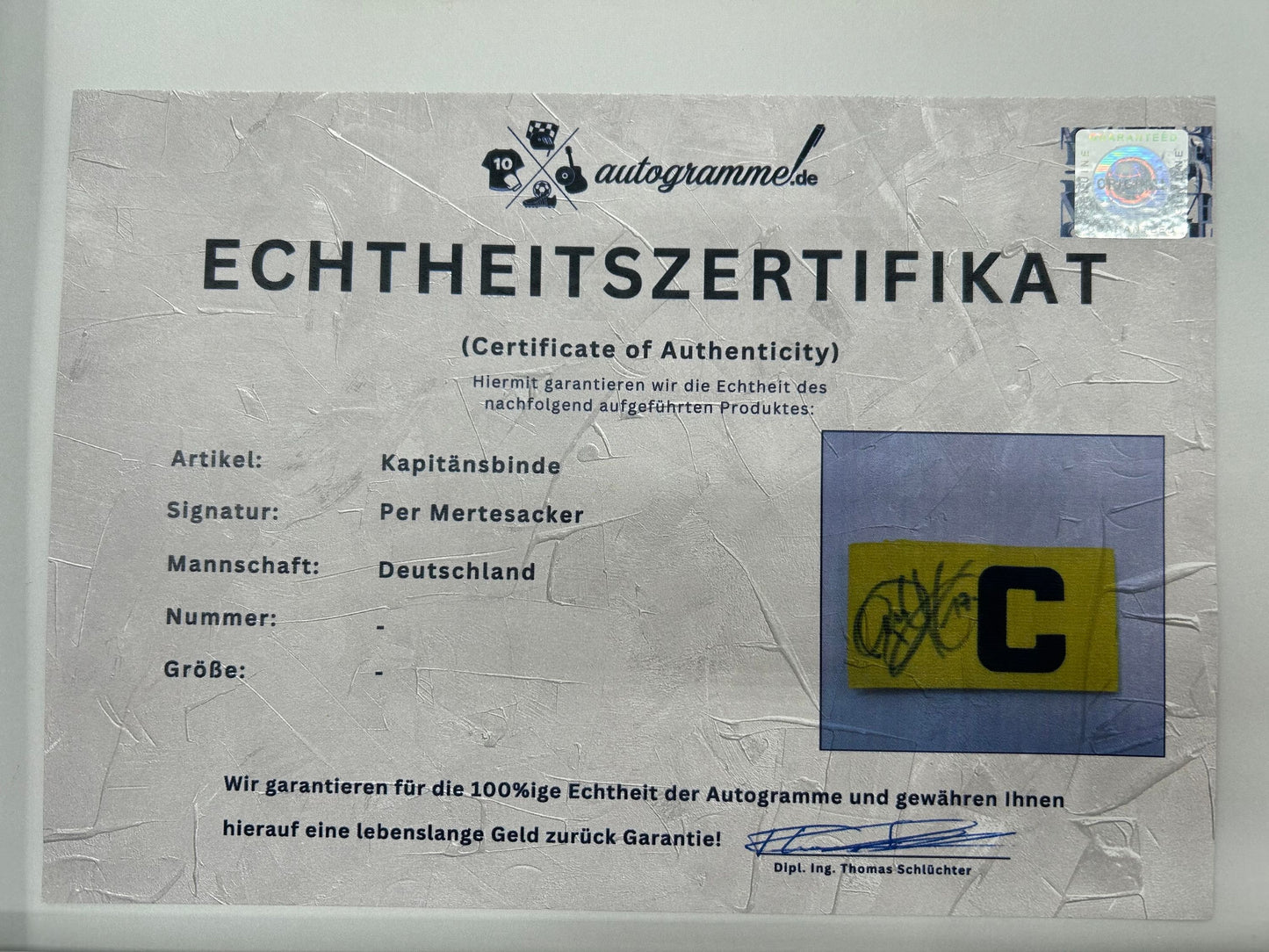 Captain bandage via Mertesacker signed as part of DFB Football autograph COA