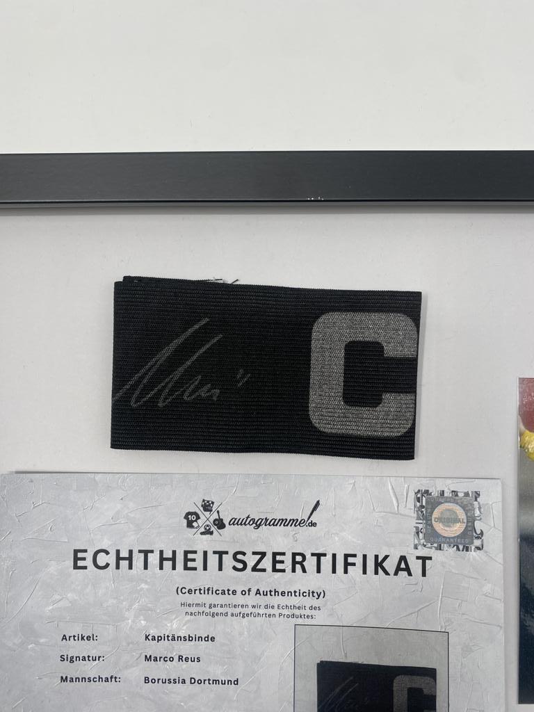 Captain's armband signed by Marco Reus in a Borussia Dortmund autograph COA frame