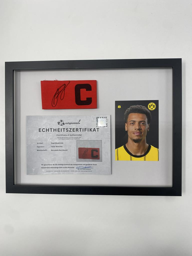Captain's armband signed by Felix Nmecha as part of the Borussia Dortmund COA