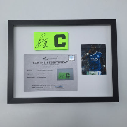 Kapitänsbinde Bryan Lasme signiert im Rahmen Schalke 04 COA grün