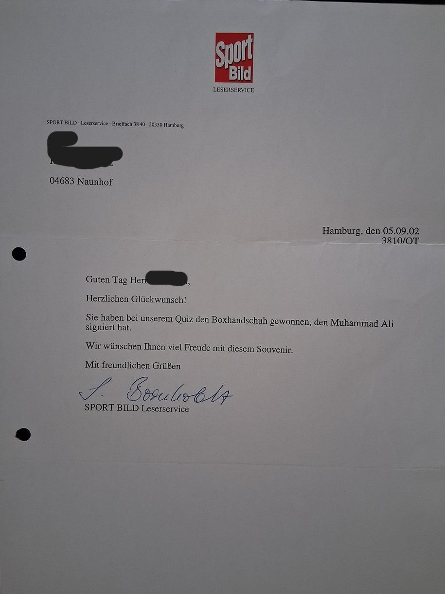 Boxing glove signed by Muhammad Ali, autographed.