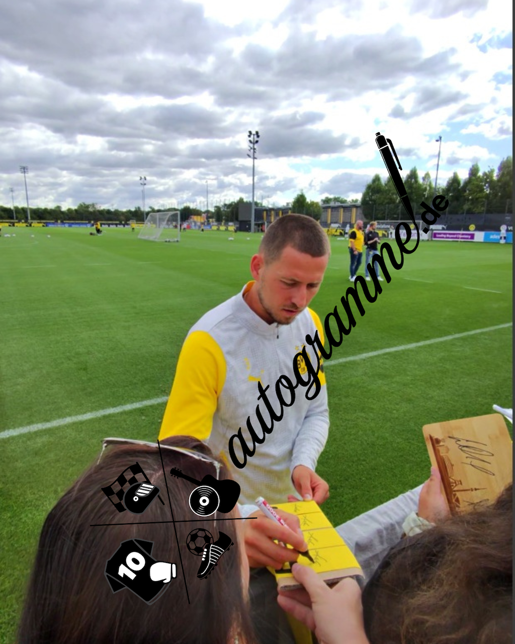 Captain's armband signed by Waldemar Anton in a Borussia Dortmund COA frame