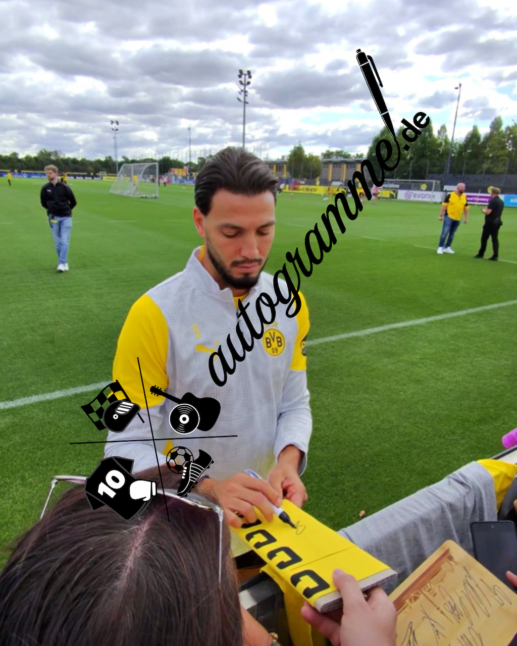 Captain's armband signed by Ramy Bensebaini in a Borussia Dortmund COA frame