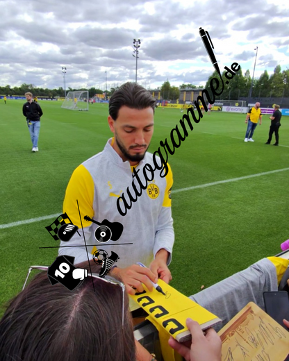 Captain's armband signed by Ramy Bensebaini in a Borussia Dortmund COA frame