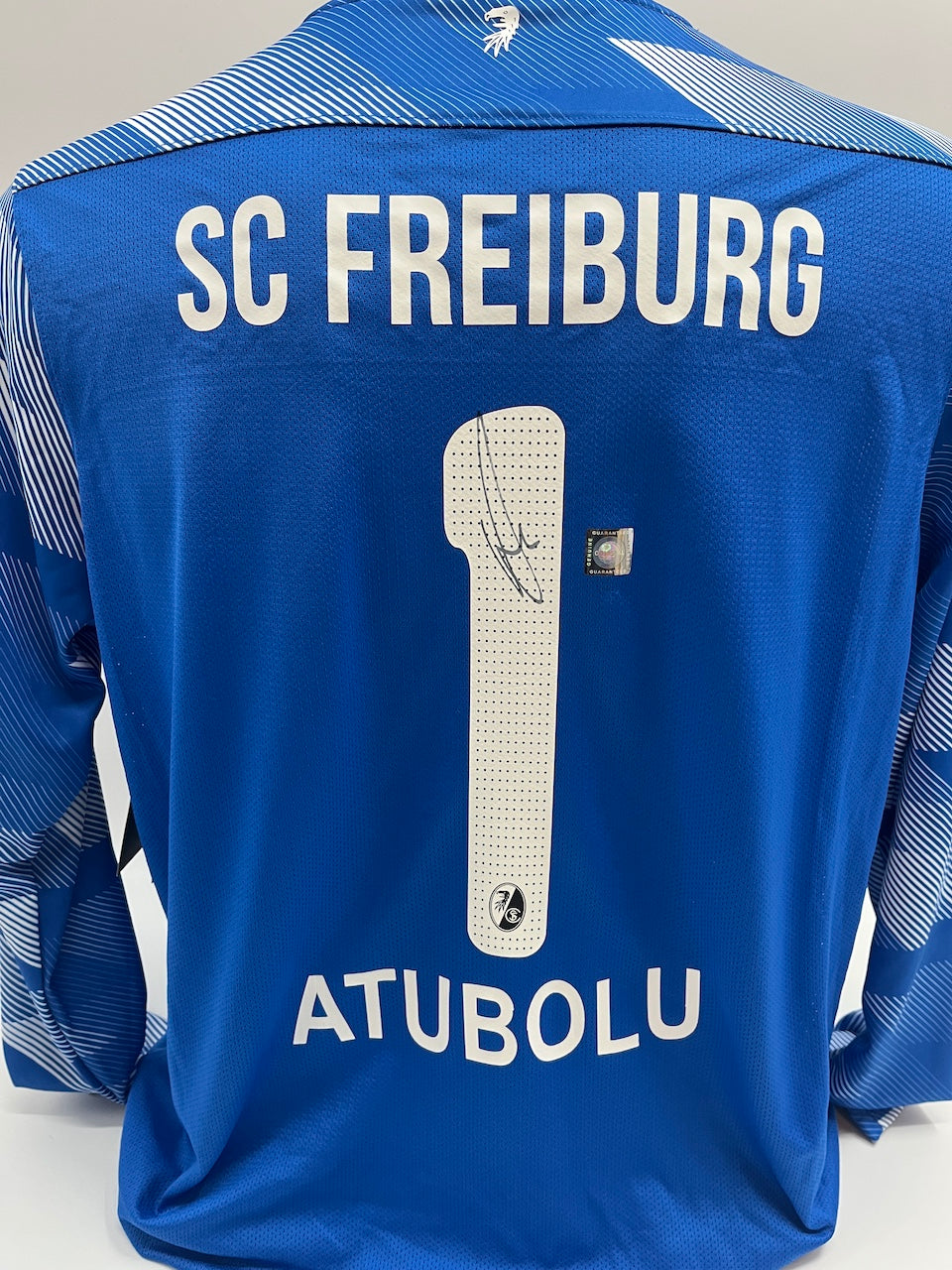 SC Freiburg goalkeeper jersey signed by Noah Atubolu, Nike XL