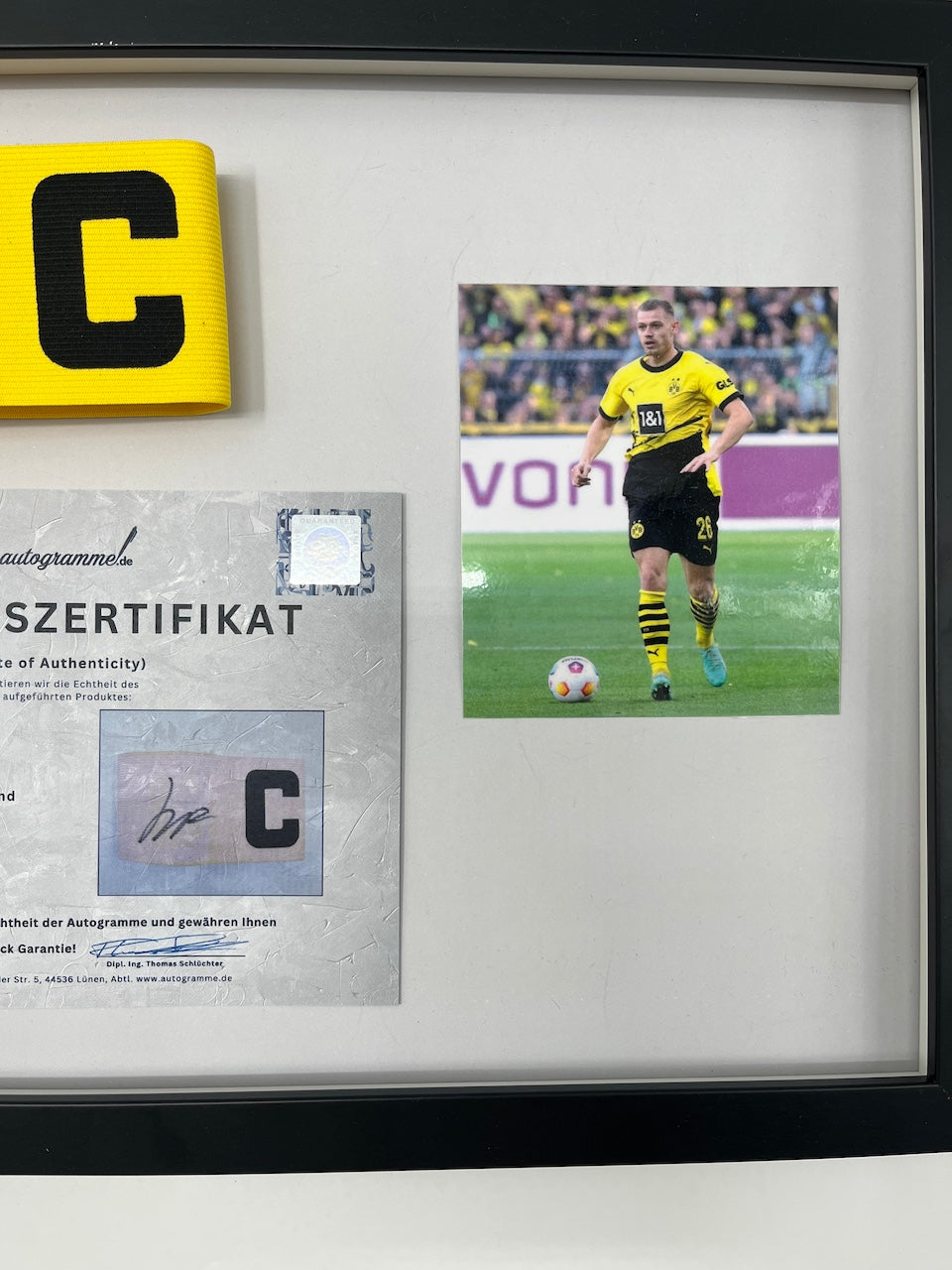 Captain's armband signed by Julian Ryerson as part of the Borussia Dortmund COA