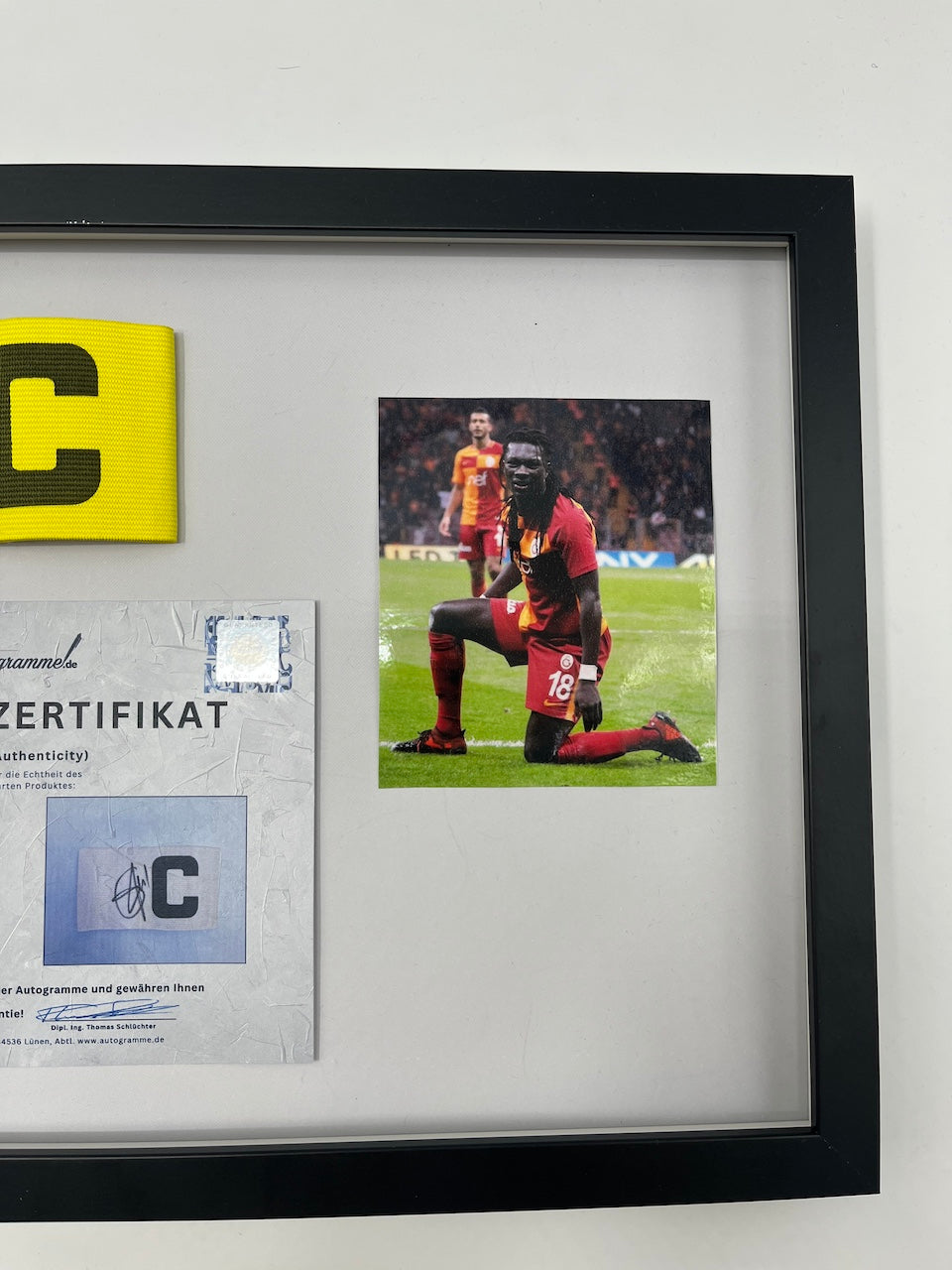 Captain's armband Bafetimbi Gomis signed in frame Galatasaray COA