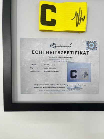 Captain's armband signed by Lucas Chevalier in a PSG COA frame