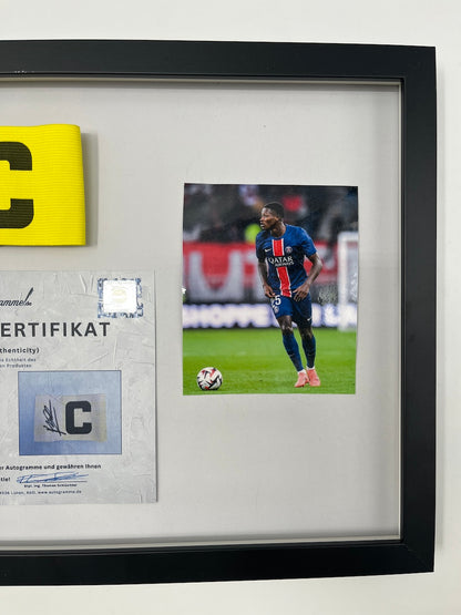 Captain's armband signed by Nuno Mendes in the PSG COA frame