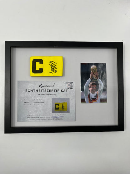 Captain's armband signed by Lothar Matthäus in a frame Germany COA