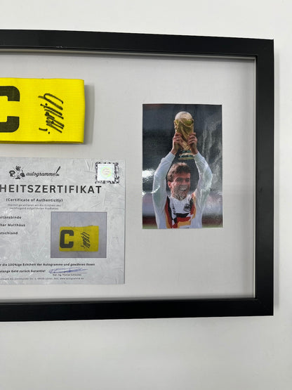 Captain's armband signed by Lothar Matthäus in a frame Germany COA