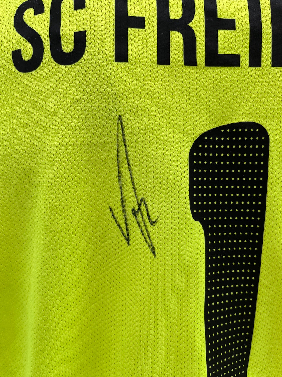 SC Freiburg goalkeeper jersey signed by Noah Atubolu, Nike XL