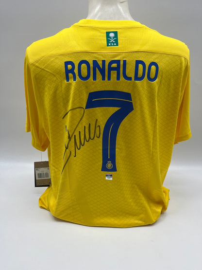 Camiseta del Al Nassr FC firmada por Cristiano Ronaldo, con certificado de autenticidad, talla XXL.