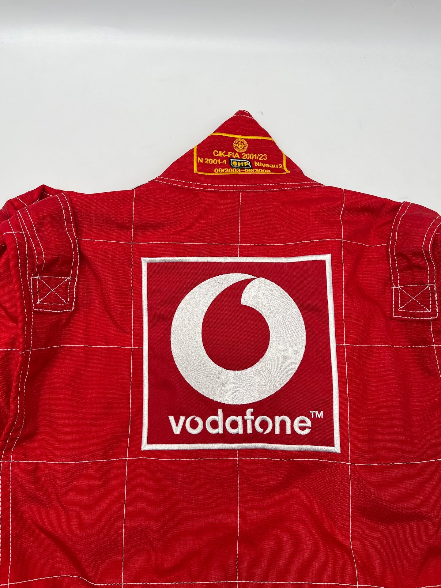 OMP Rennanzug signiert von Michael Schumacher Autogramm