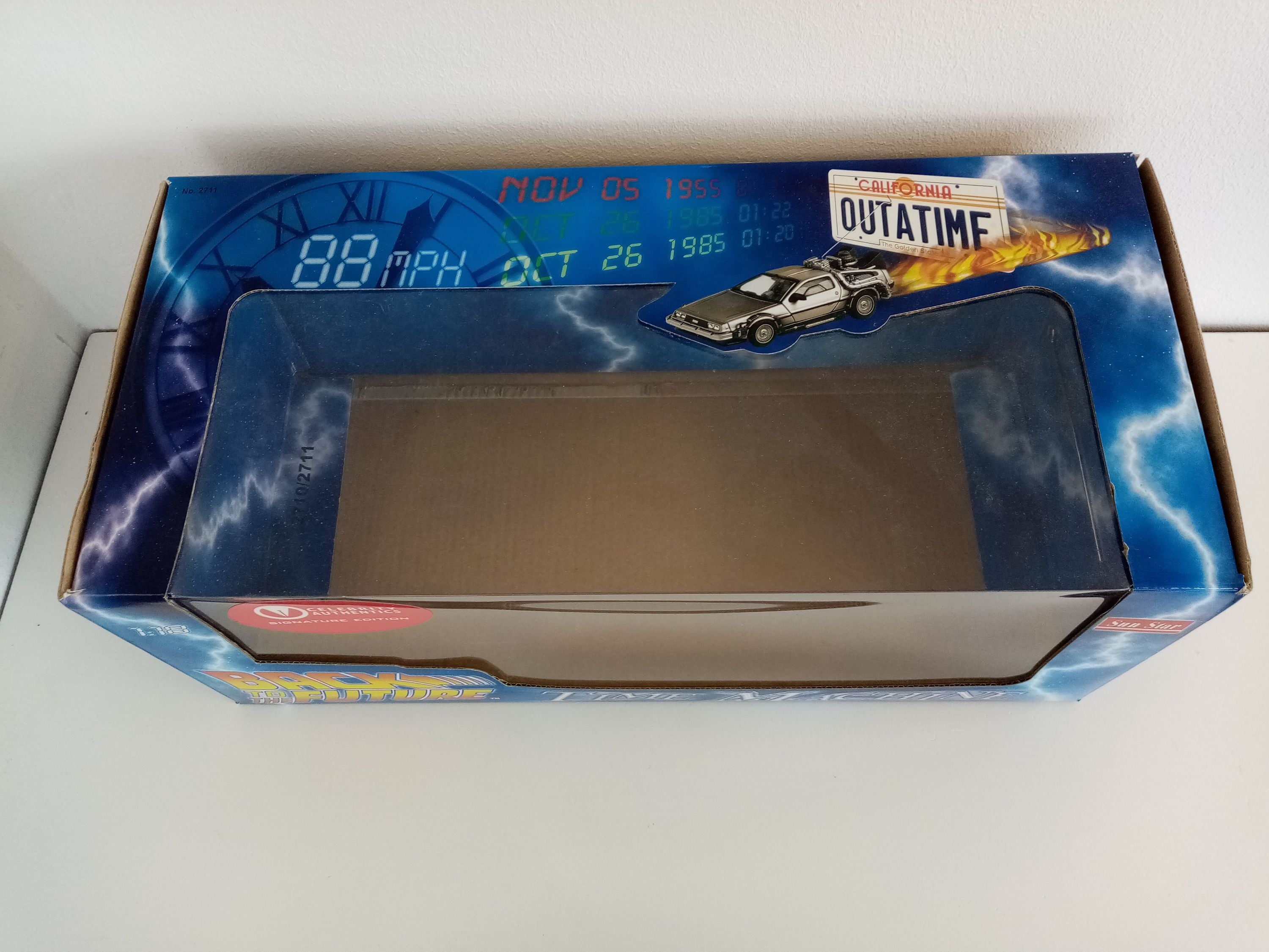 Back to the future model car signed by the actors of the film